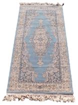 A Belgian Super Keshan blue ground rug, 162cm x 84cm.