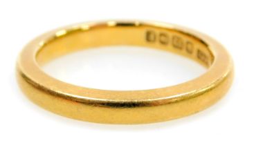 A 22ct gold wedding band, size J, 4.6g.