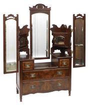 A late Victorian mahogany and walnut dressing chest, with a central swing frame mirror and two side