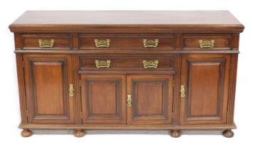 A Victorian mahogany sideboard, by James Schoolbred & Company, with two long drawers flanked by two