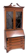 An Edwardian mahogany bureau bookcase, with satinwood cross banding, and shell paterae inlay, the br