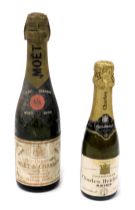 A half bottle of Moet & Chandon Champagne 1959, together with a quarter bottle of Charles Heidsieck