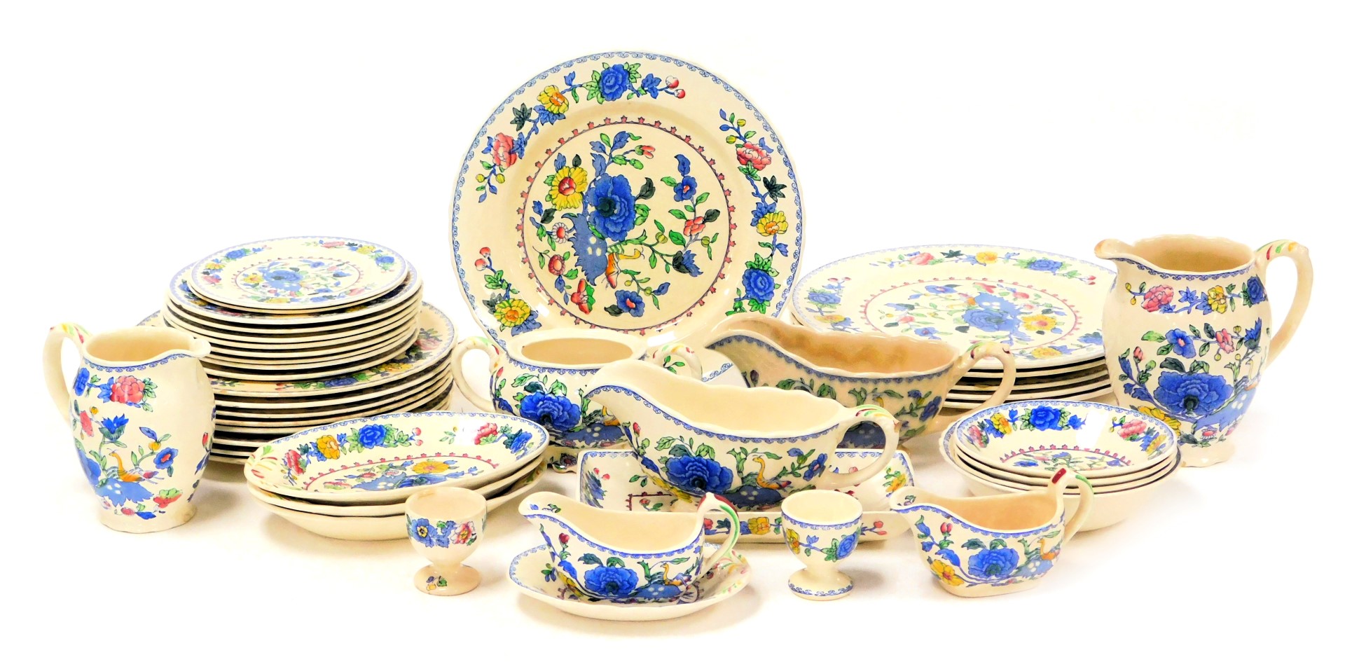 A group of Masons Regency pattern dinner wares, including sauce and gravy boats, dinner, dessert and