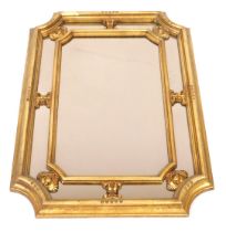 A Regency style gilt wood and gesso rectangular wall mirror, with canted corners, 96.5cm high, 70.5c