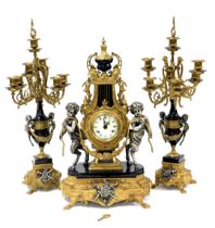 An Imperial brass and enamel clock garniture, the clock with a circular dial bearing Roman and Arabi