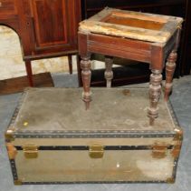 A large trunk and a piano stool. (2)