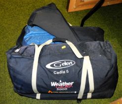 A Gelert Five Weather Check 3000 fire retardant tarpaulin in bag.