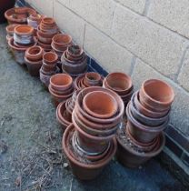 A large quantity of terracotta garden planters. (40)