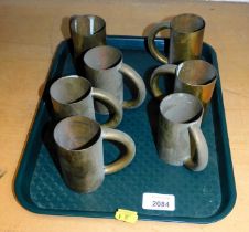 Seven silver plated tankards. (1 tray)