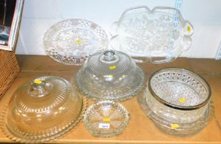 Cut glass items, including large trays, dishes with covers, large ashtray and a bowl with a silver p