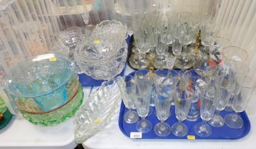 Glassware, including cut glass, glass bowls, drinking glasses, champagne flutes, etc. (three trays a