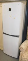 A Zanussi fridge freezer. This lot is located at our additional premises SALEROOM SIX, Unit 6, Elle