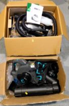 A vacuum cleaner with steam function and a garden leaf blower. This lot is located at our additional