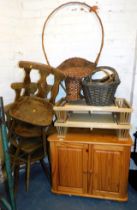 Furniture, comprising a pine two door cupboard, four kitchen chairs, wicker baskets and two wash tra