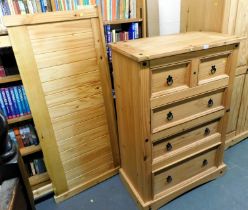 A pine chest, of two short over three long drawers, raised on a plinth.