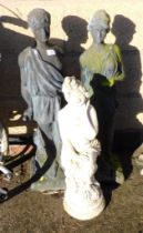 Three garden figural statues.