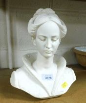 A ceramic bust of a lady.