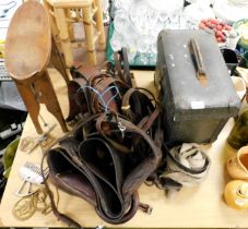 Horse tack including a small stool, a Moss Bros box containing a Moss Bros top hat, Martingales, rei