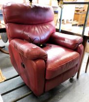 A Sherborne red leather electric reclining armchair.