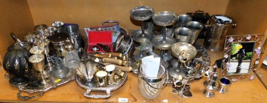 Silver plated wares, including two large trays, a large salver, biscuit barrel, goblets, etc. (all l