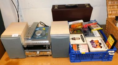 A Hitachi stereo system, model no. AXM81U tuner/cd/mp3 player, an MX81U amplifier and speakers, and