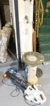 A garden ornamental bird bath, a wire mesh planter, garden hanging bird feeder and a leaf blower Thi