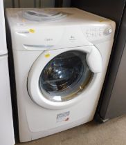 A Hoover Optima washing machine, with 6kg load, 1400 Revolutions, model no. HPH614.