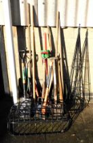 Garden tools, to include spades, axe, fork, shears, two metal climber plant trainers and two metal w