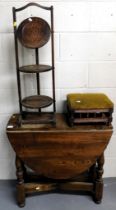 A folding oak gate leg table, a oak folding cake stand and late Victorian stool. (3) This lot is lo