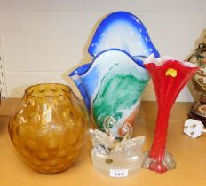 Decorative glassware, including two vases, a large decorative glass vessel and a pair of swans on a