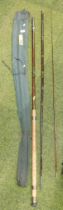 An Allcocks Gloria three piece split cane float fishing rod, with canvas bag.