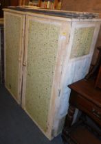 A white painted pine two door cupboard.