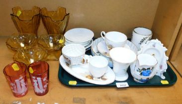 Glass and ceramics, including etched glass, cranberry glasses, dessert glasses and a part tea servic