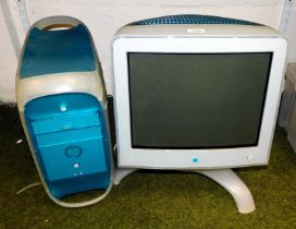 An Apple computer monitor and a hard drive.