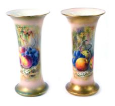 A pair of Royal Worcester porcelain vases, c1918, of trumpet form, painted by Ricketts, decorated wi