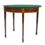 A George III mahogany demi lune fold over card table, with rosewood cross banding and satinwood sunb