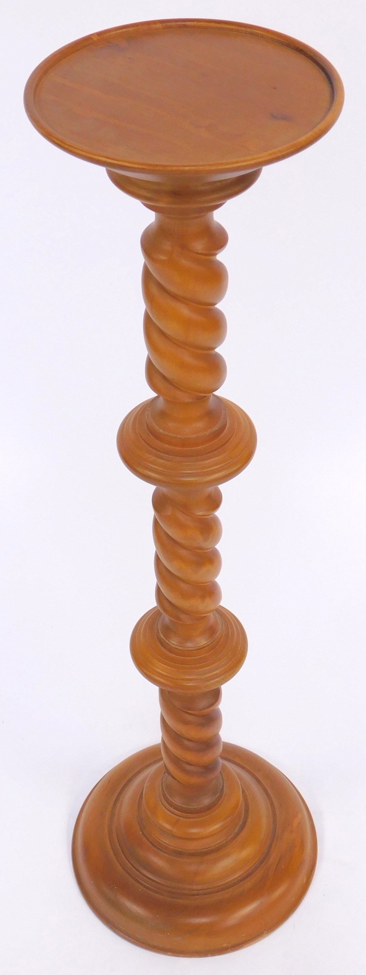 A 20thC hardwood jardiniere stand, the circular top raised on a three part turned column, on a circu - Image 2 of 2