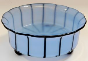 A Michael Powolny for Loetz blue opaque glass bowl, with an everted black rim and multiple black ver