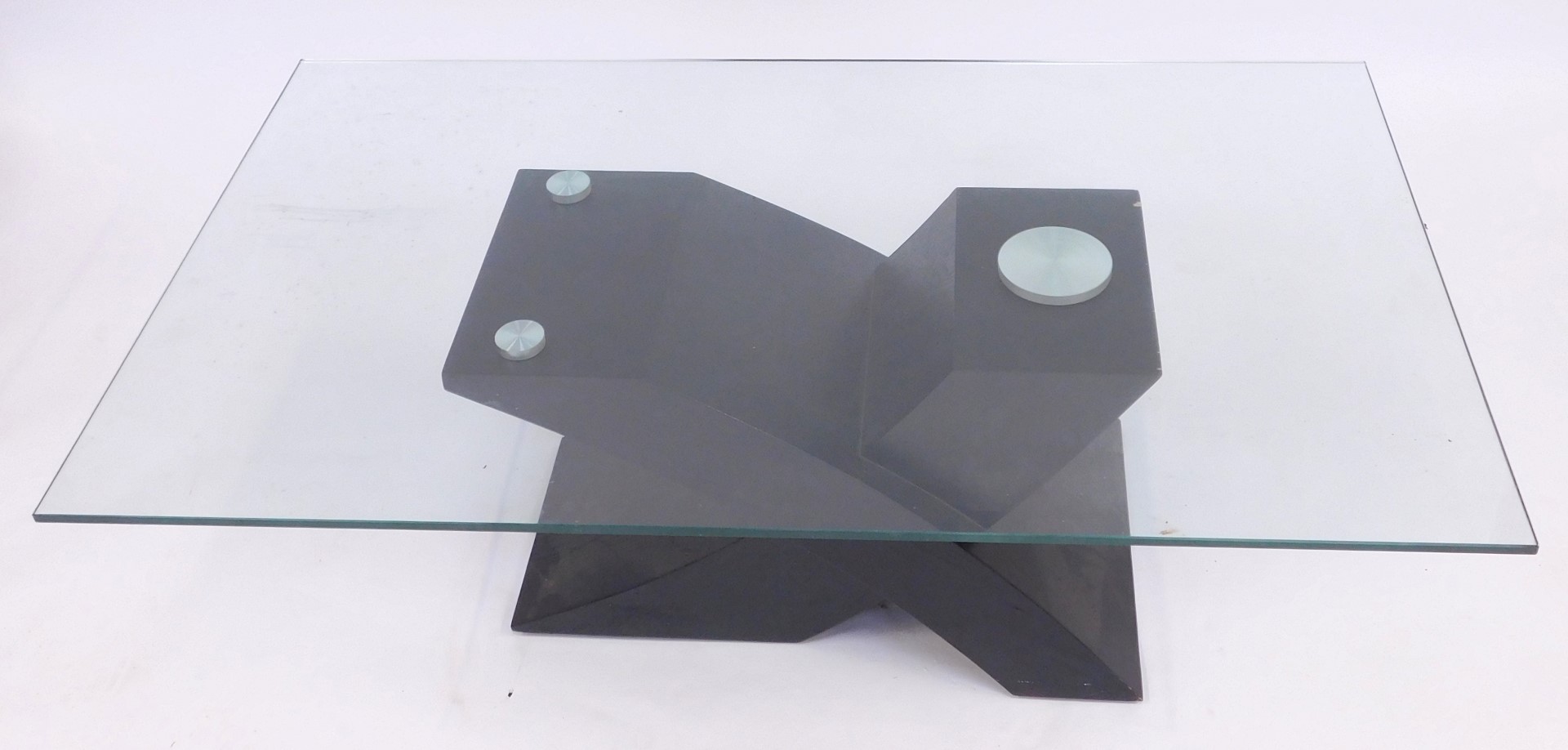 A modern coffee table, the glass rectangular top raised on an ebonised base of abstract X shaped for - Image 2 of 2