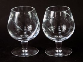 A pair of Waterford Crystal brandy glasses, in the Siren pattern, stamped to underside.