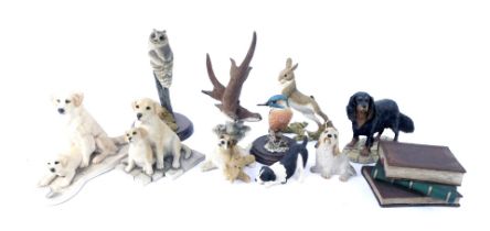 A group of Sherratt & Simpson figures, to include kingfisher, Labrador, two otters, rearing hare, et