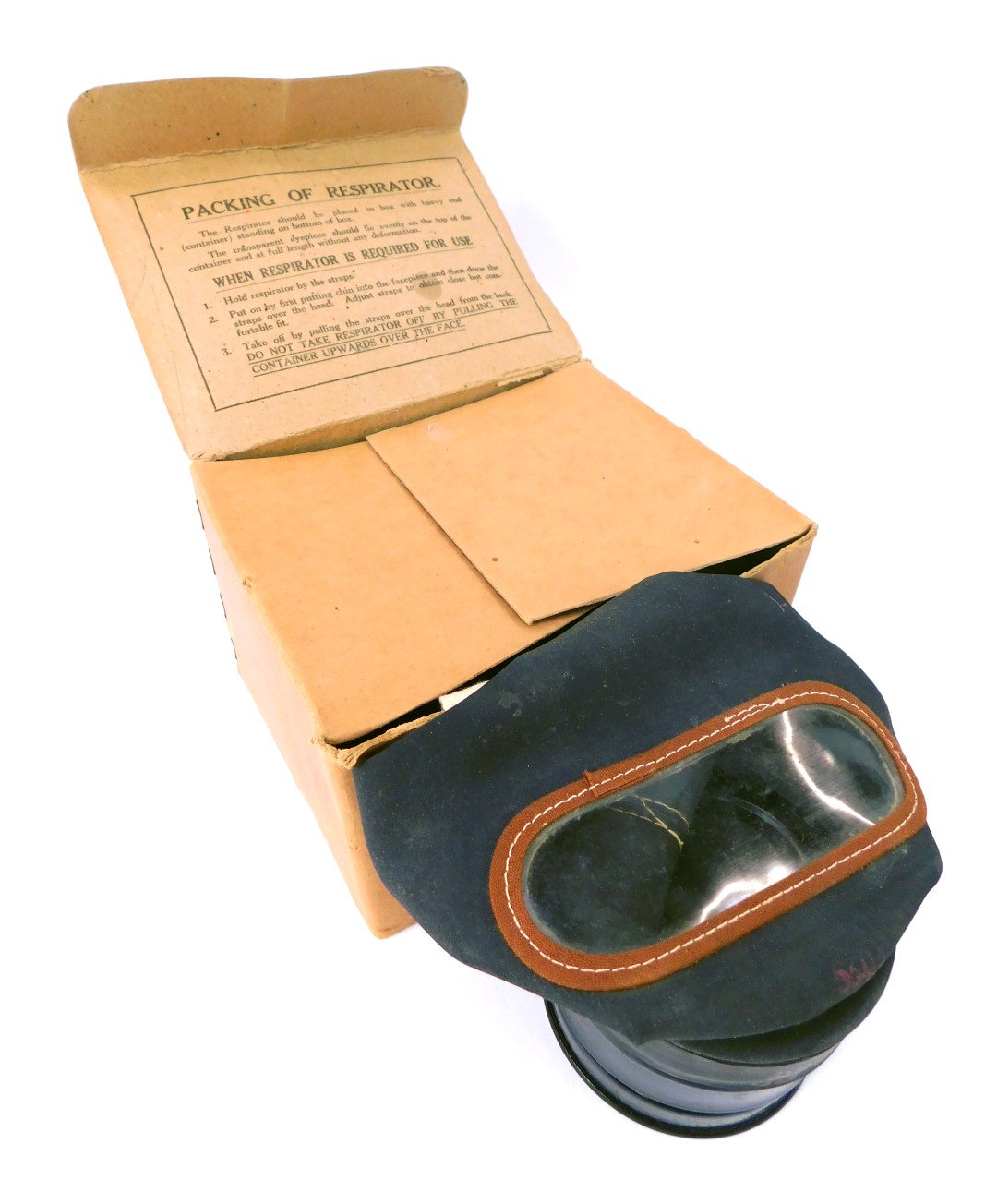 A World War II respirator, boxed.