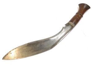 A Nepalese or Indian Kukri, with wooden handle and curved steel blade, together with a leather scabb