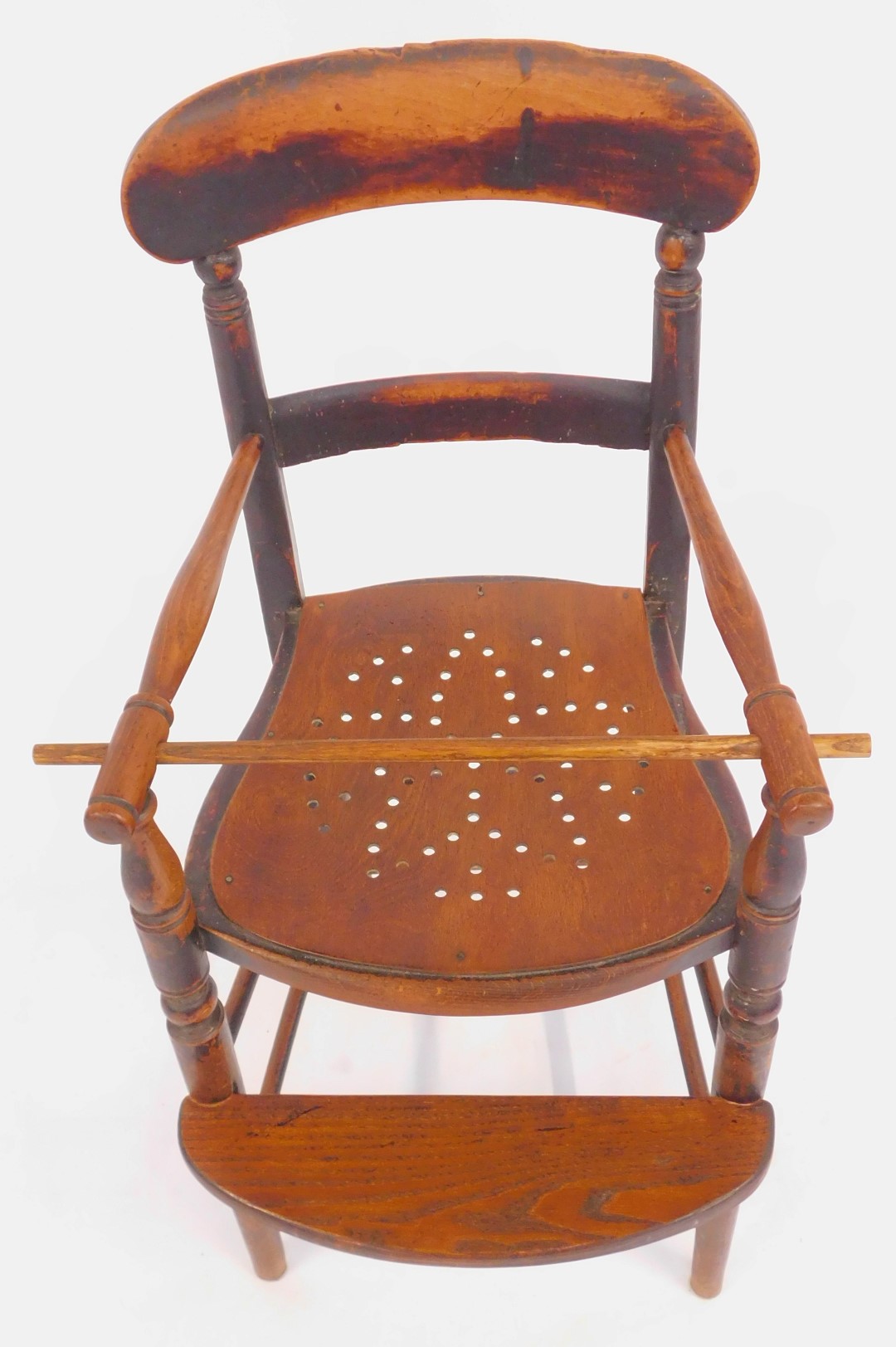 A 19thC elm child's highchair, with solid rail and turned supports, pierced later seat, on turned le - Image 2 of 2