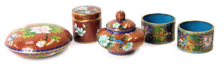 Oriental cloisonne wares, comprising miniature jar and cover, 6cm high, two blue napkin rings, 3.5cm