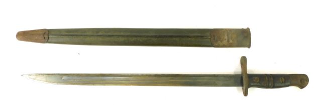 A World War I bayonet, with wired handle grip and steel blade, in material scabbard, stamped IAB wit