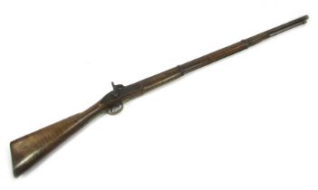 An Enfield Tower 1857 pattern percussion musket, with ramrod, and walnut stock, bearing stamp 1857 T