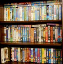 Various Disney and other VHS tapes, to include Lady and the Tramp, The Aristocats, Snow White and th