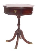 A Strongbow Furniture mahogany occasional table, the octagonal drum top inset with a green tooled le
