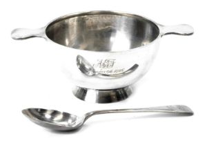 An Edward VII silver two handled quaich, inscribed AEJ September 9th 1928, of plain design, with mat